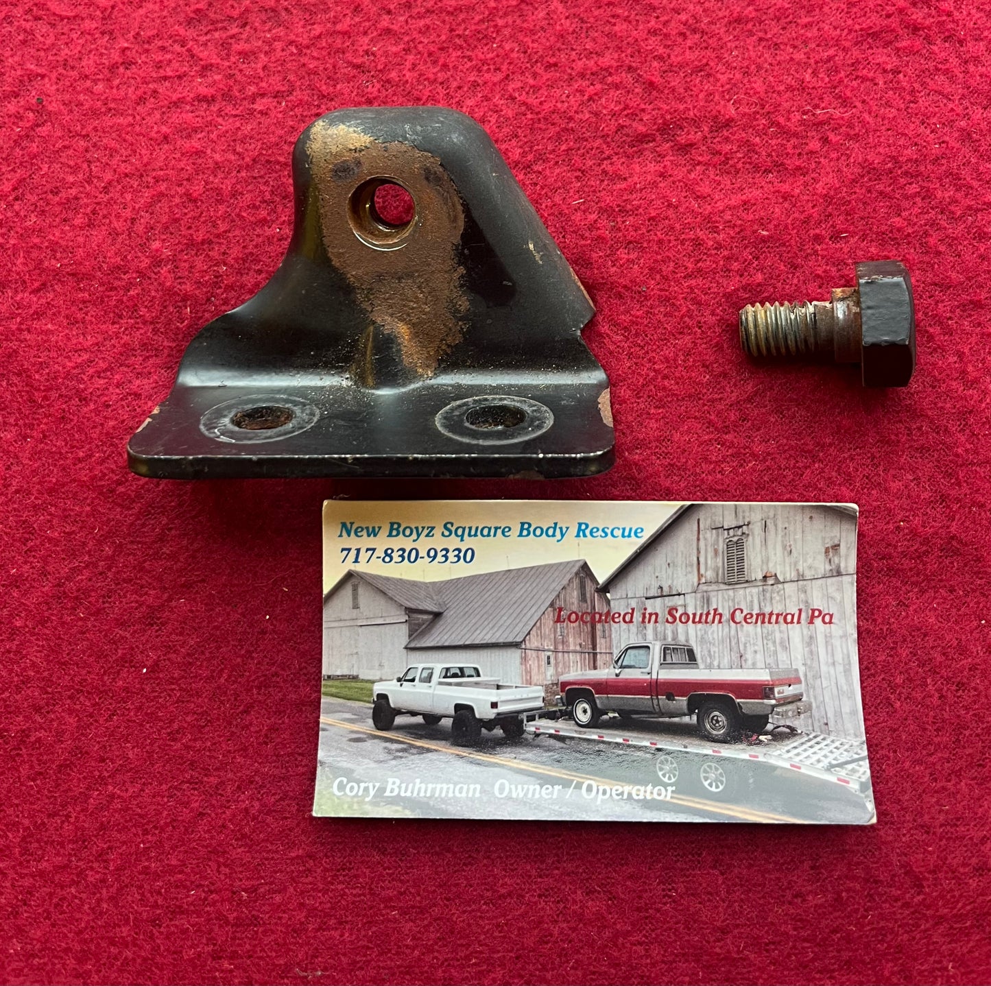 Bracket, Rear Seat Stowage Strut Lower Bracket (With Bolt)