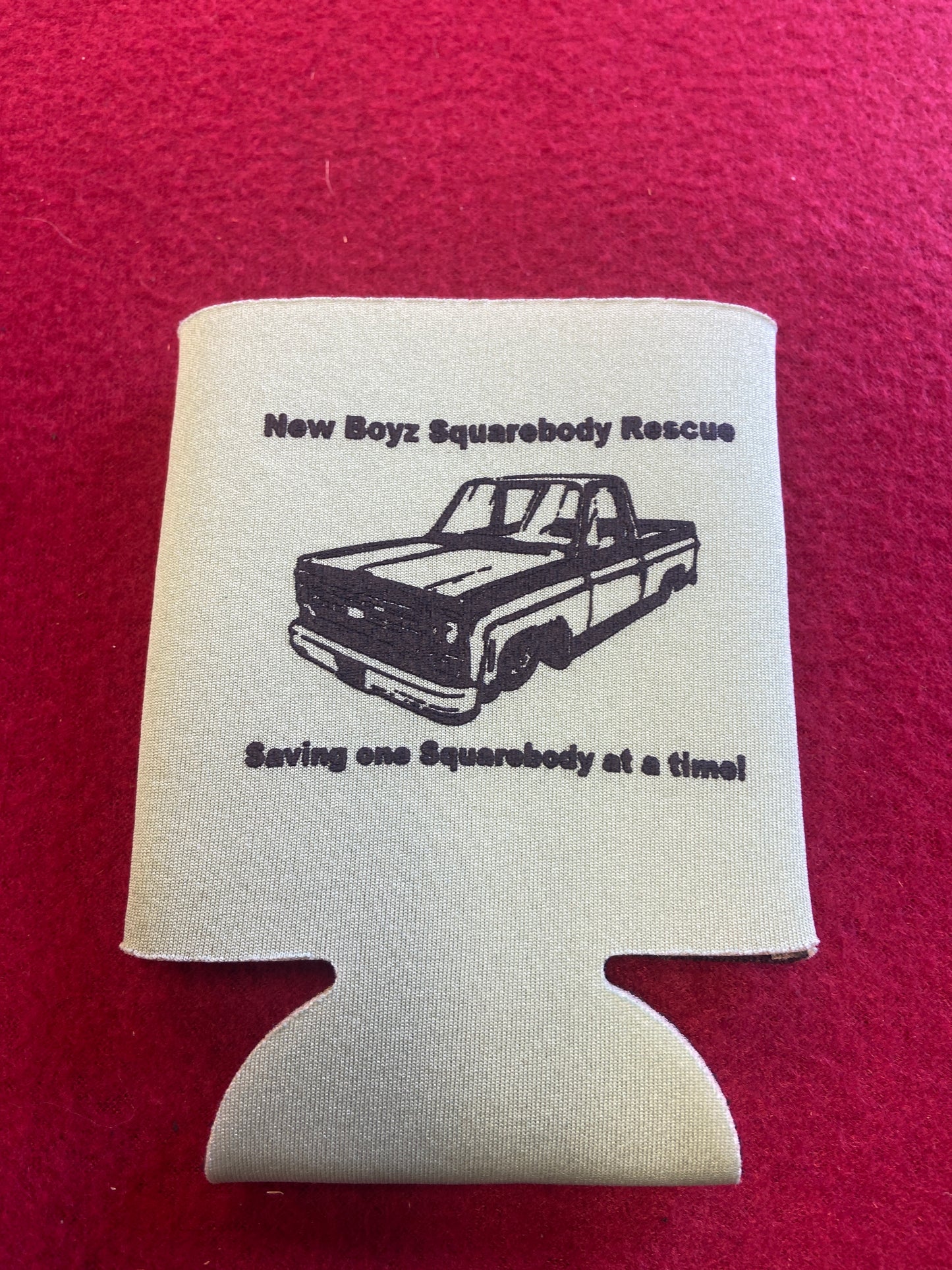 Koozie green with black logo